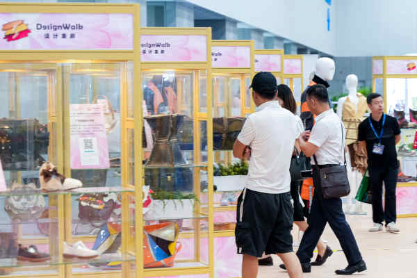 Visitor viewing the footwear, bags and products display at the Design Walk area in Shoes & Leather - Guangzhou