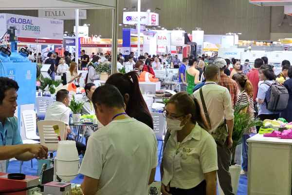 Visitors find footwear machines at machinery hall in Shoes and Leather - Vietnam