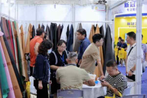 Buyer selecting material at Shoes & Leather - Guangzhou by Top Repute Co. Ltd."
