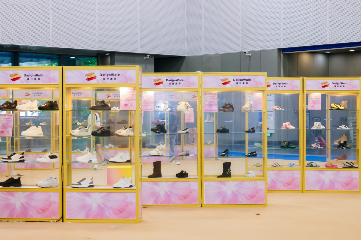 Visitor viewing the footwear, bags and products display at the Design Walk area in Shoes & Leather - Guangzhou