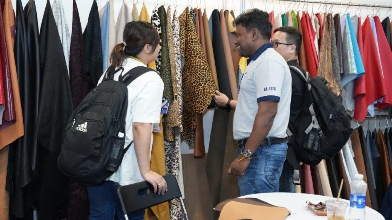 Manufacturers sourcing leather hide in the exhibition by Top Repute Co. Ltd